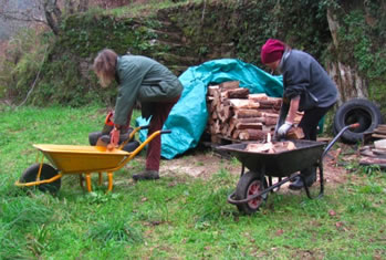 Helen and me cutting the day's firewood