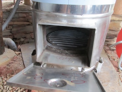 The bailarina's firebox - our 150-litre Portuguese-made wood-fired water heater