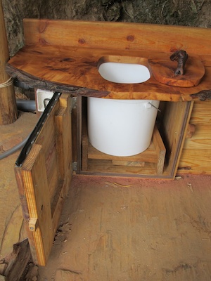 Compost toilet construction for cob bathroom