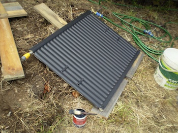 Solar water heating - connect it, test it, flush it through, rub it down, and paint it matt black