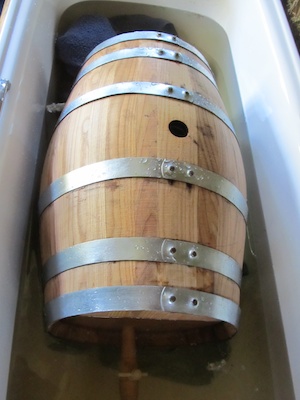 50 litre chestnut wine barrel soaking in the bath