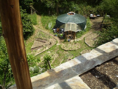 Shade netting strapped to yurt